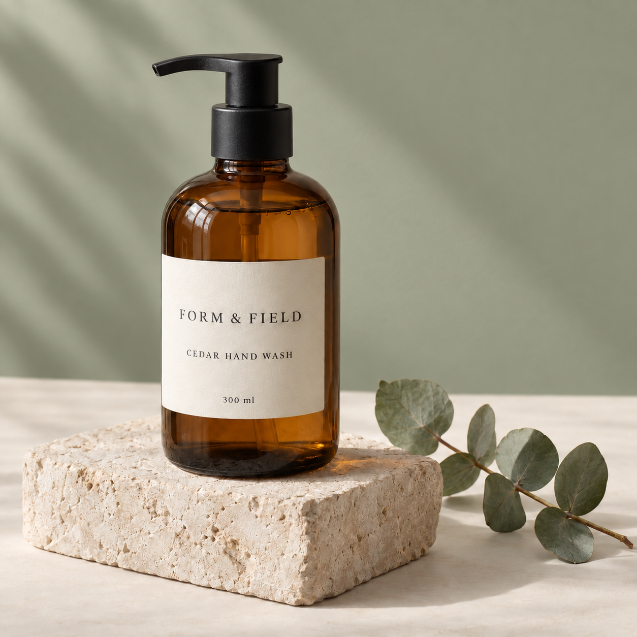 The illustrative soap-bottle scene after changing the cream wall to sage green, retaining the readable label and overall composition